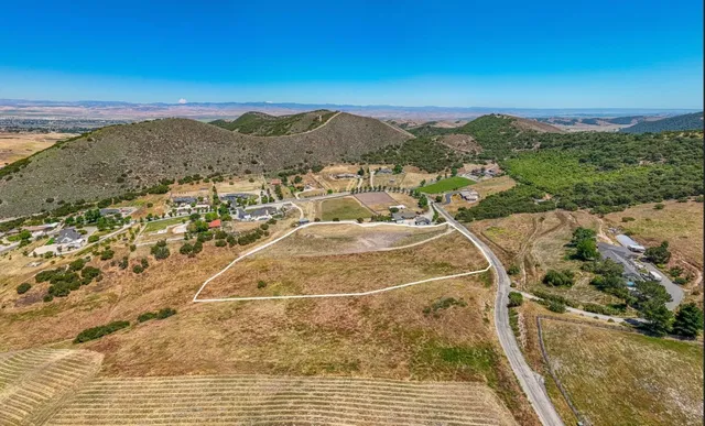 a view of a balcony with an ocean
