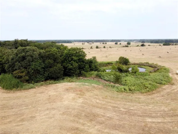 a view of a lake with a beach