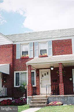 730 Aldworth Road Dundalk, MD 21222 - Photo 1 of 1 a front view of a house with garden