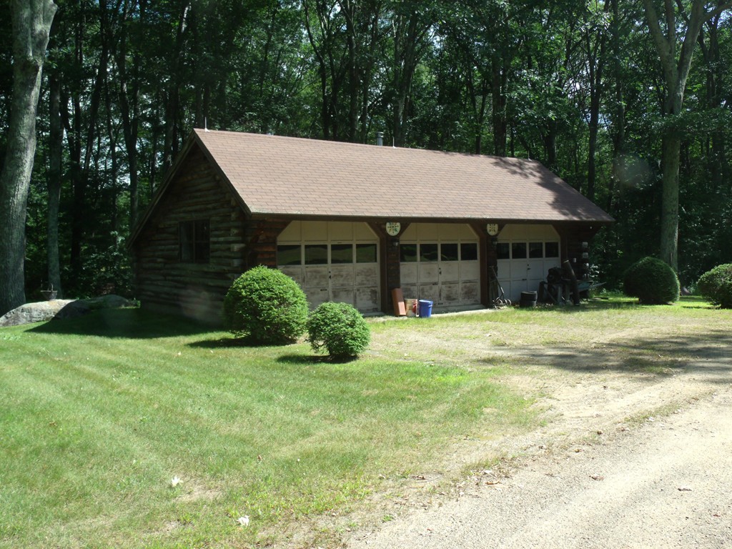 25 Lynch Road Wales, MA 01081 - Photo 3 of 28 a view of a house with backyard and garden