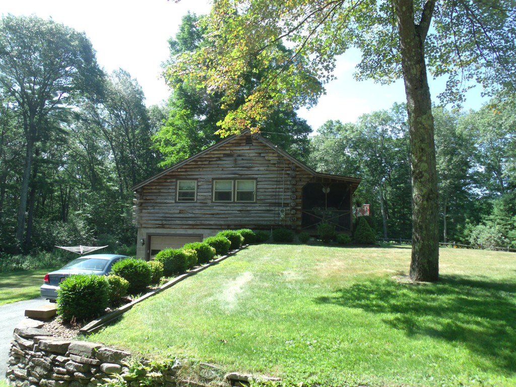 25 Lynch Road Wales, MA 01081 - Photo 7 of 28 a view of backyard with tree