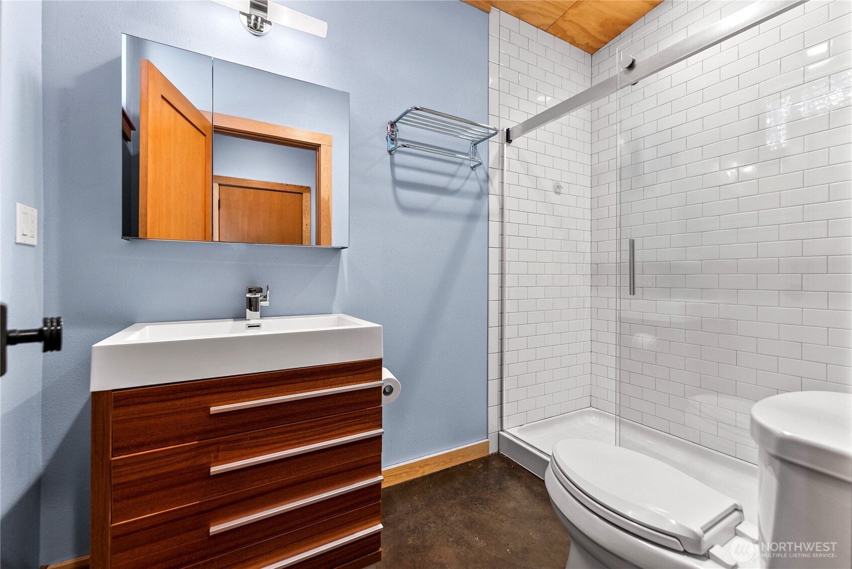 16 Littell Road Mazama, WA 98833 - Photo 32 of 40 a bathroom with a sink a toilet and shower