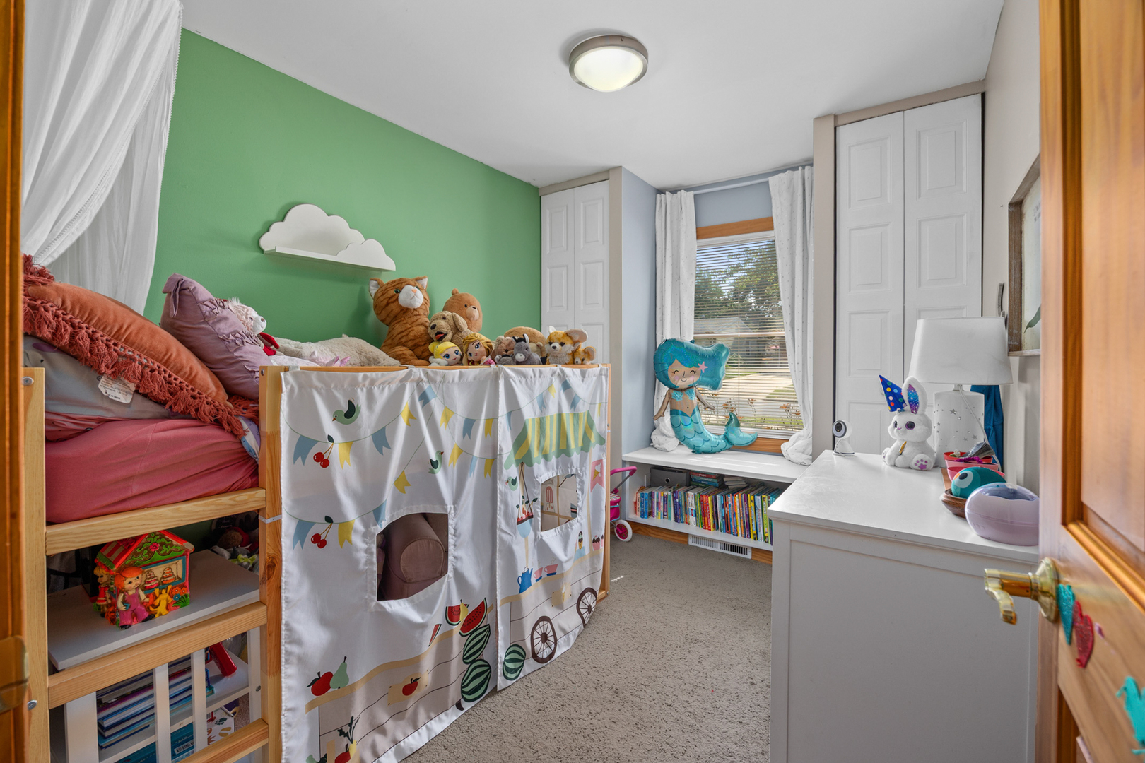 211 David Drive Streamwood, IL 60107 - Photo 15 of 24 a bedroom with furniture and a large window