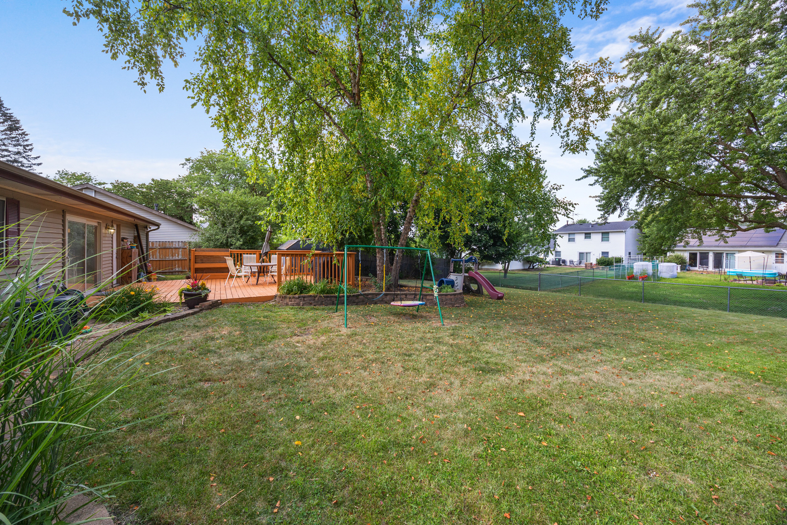 211 David Drive Streamwood, IL 60107 - Photo 18 of 24 a front view of a house with garden