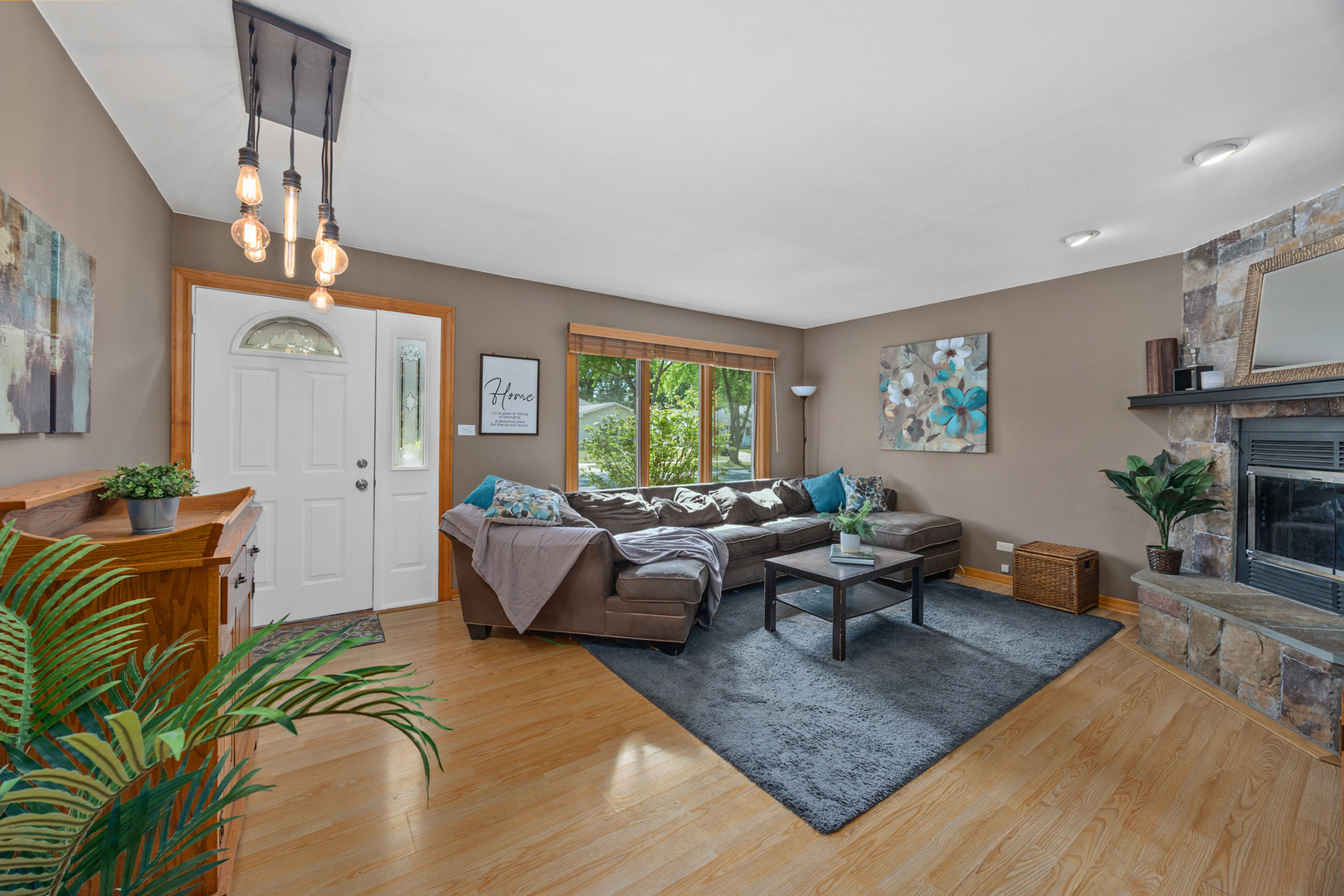 211 David Drive Streamwood, IL 60107 - Photo 3 of 24 a living room with furniture and a large window