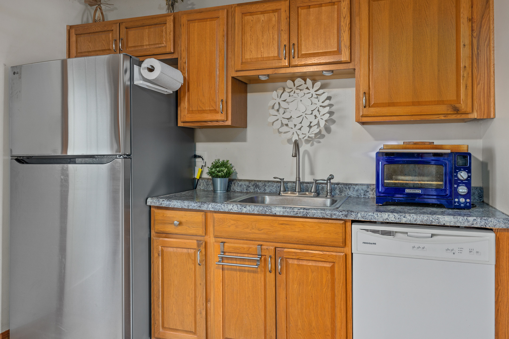 211 David Drive Streamwood, IL 60107 - Photo 8 of 24 a kitchen with stainless steel appliances granite countertop a refrigerator and a sink