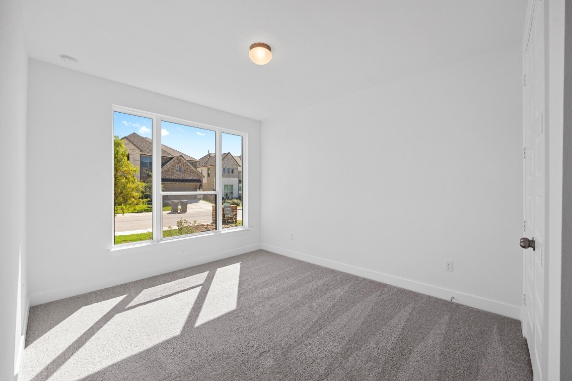 320 Buckaroo Drive Georgetown, TX 78633 - Photo 15 of 31 an empty room with a window