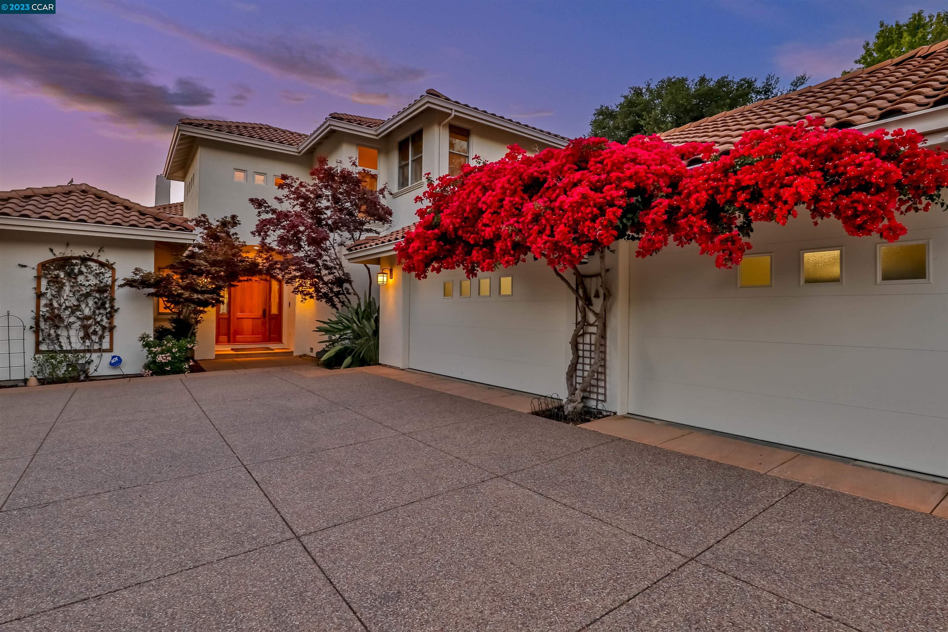 front view of a house with a street