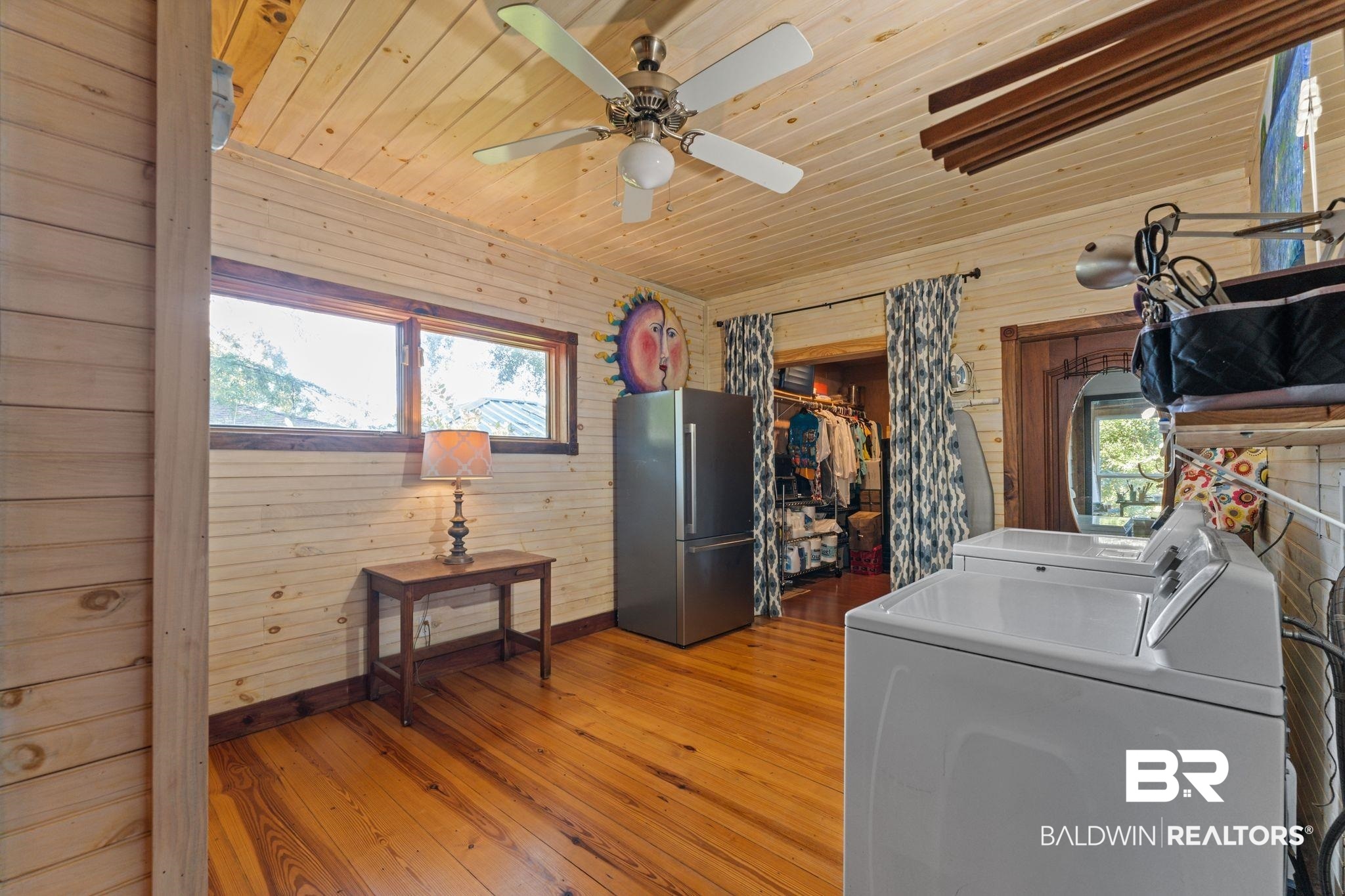 16451 Honey Road Summerdale, AL 36580 - Photo 44 of 55 Laundry area featuring wood walls, light wood-style floors, wooden ceiling, and separate washer and dryer
