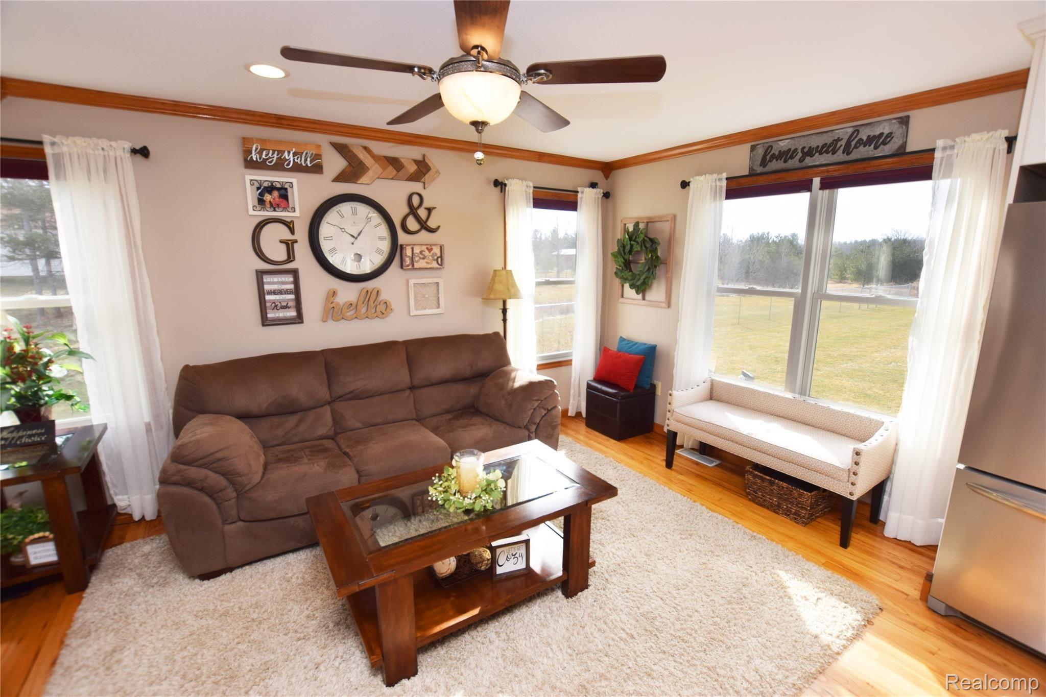 9247 Cook Road Gaines, MI 48436 - Photo 6 of 25 Living Room with Real Wood Floors