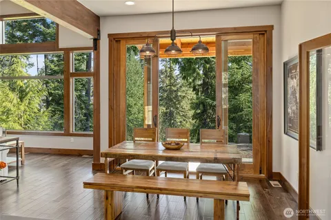 a view of a living room with furniture and window