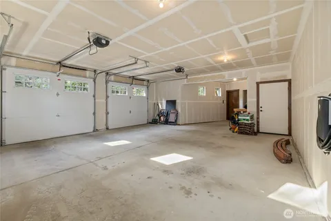 view of a city with lush green forest