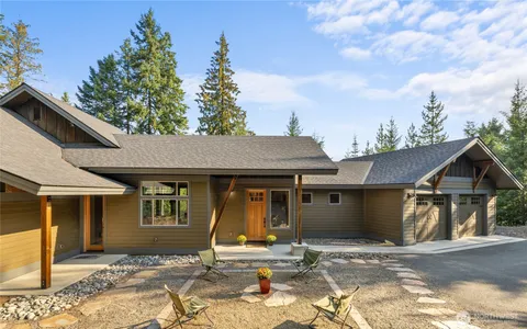 a house with trees in the background