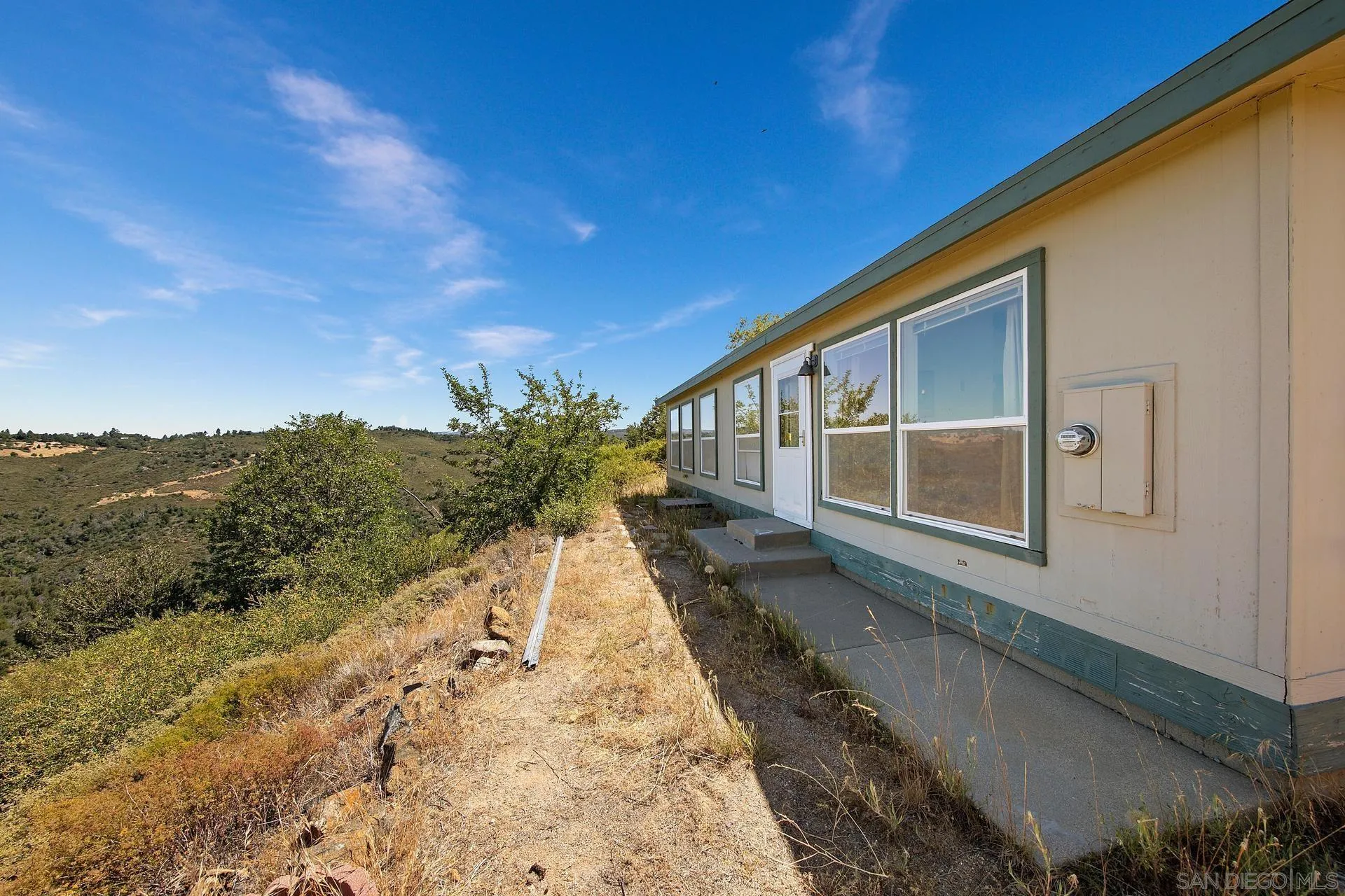 5017 Acorn Patch Road Julian, CA 92036 - Photo 8 of 12 a view of a house with a yard