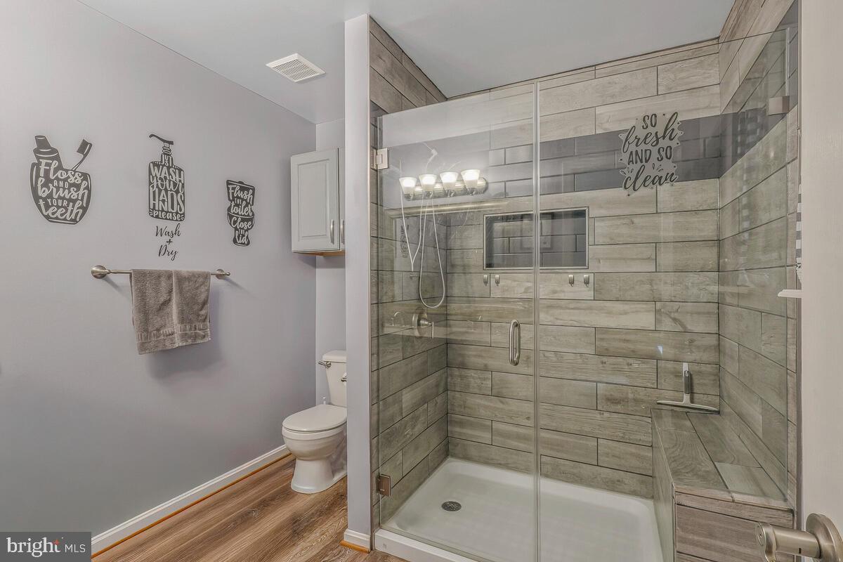 6115 Port Tobacco Road La Plata, MD 20646 - Photo 5 of 27 a bathroom with a shower and a toilet
