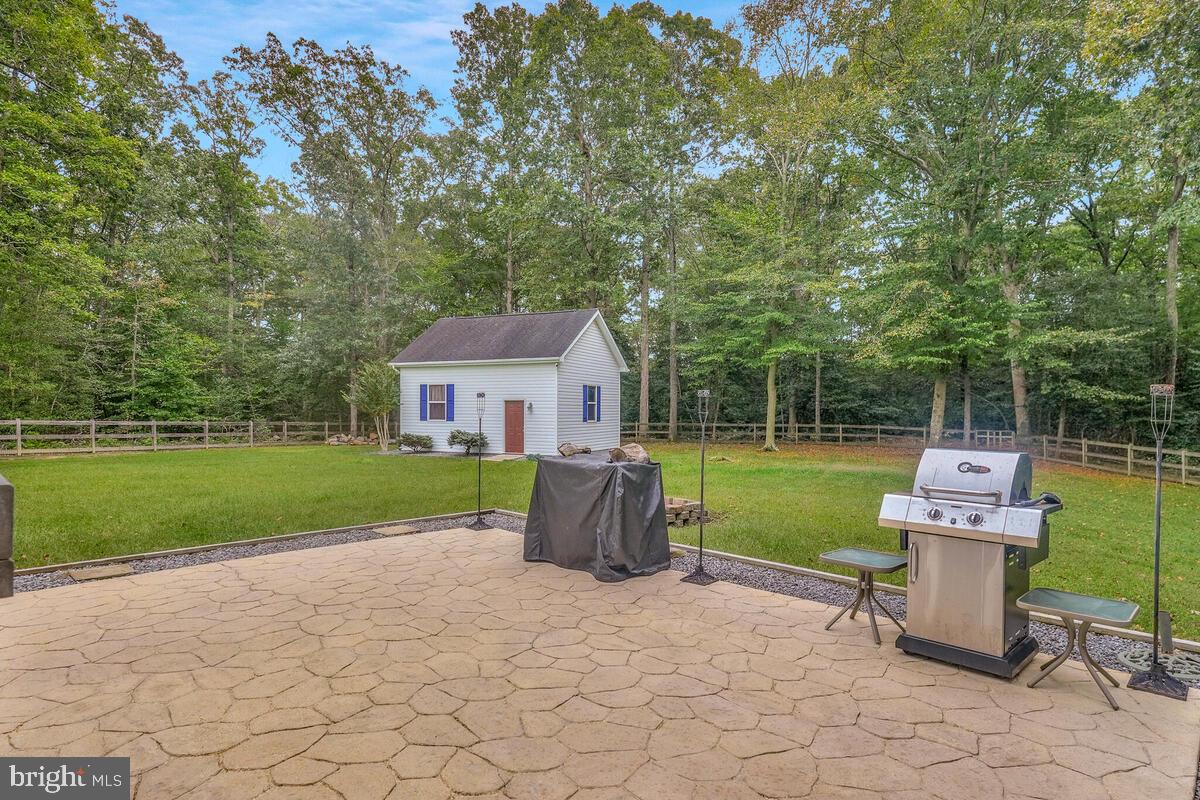 6115 Port Tobacco Road La Plata, MD 20646 - Photo 7 of 27 a view of a house with backyard porch and garden