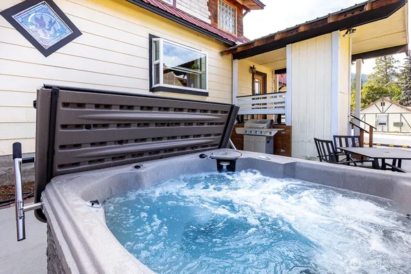 a view of kitchen with wooden floor and furniture