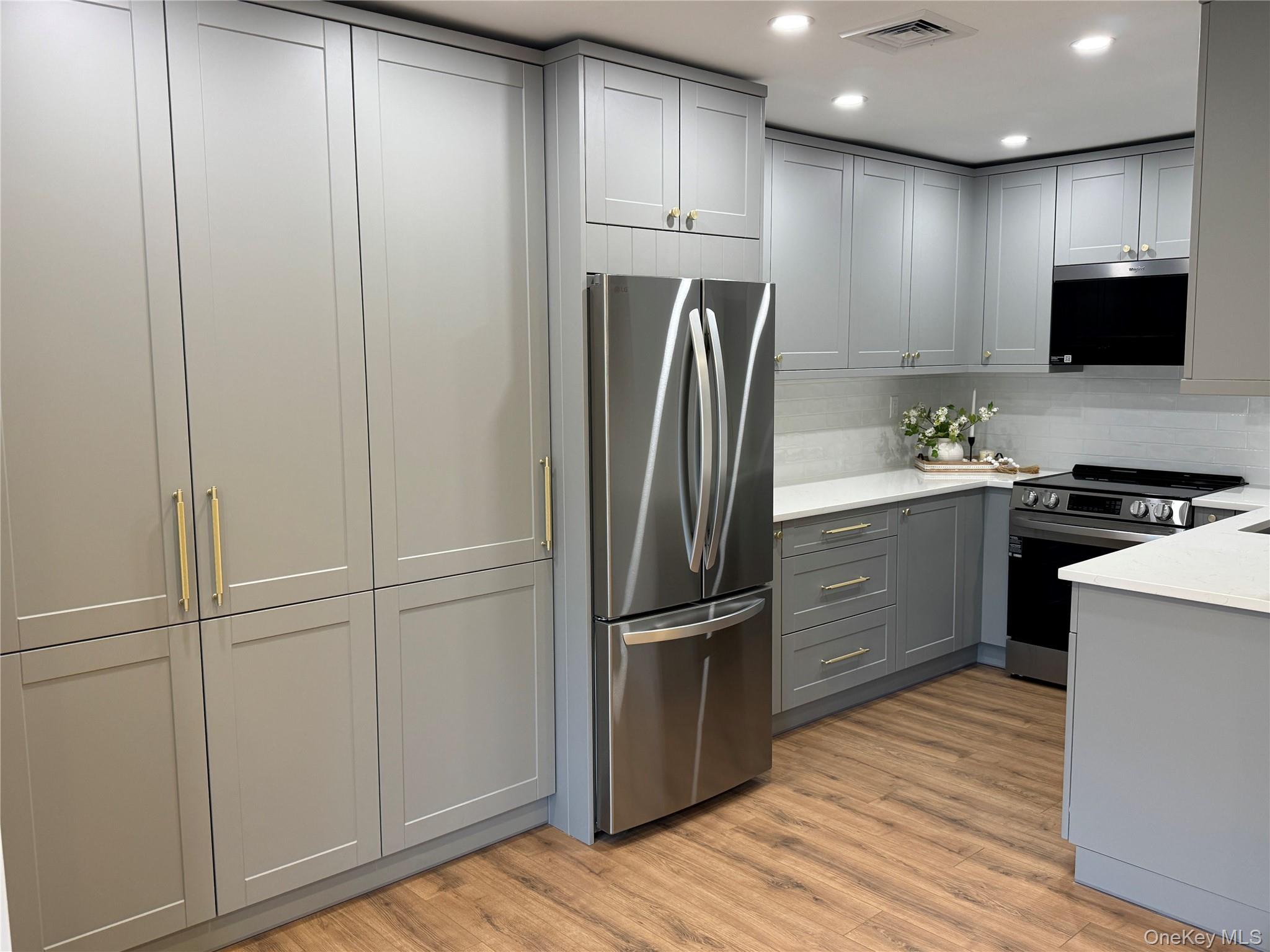 404 Woodbridge Drive, Unit B Ridge, NY 11961 - Photo 6 of 8 Extra cabinet space