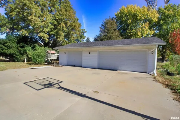 a house with trees in front of it