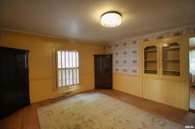 an empty room with windows