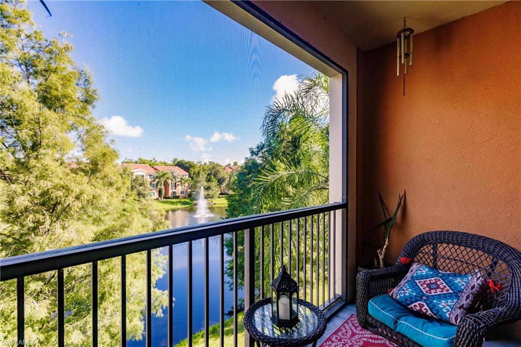 1230 Reserve Way, Unit 302 Naples, FL 34105 - Photo 16 of 28 a view of a balcony with furniture
