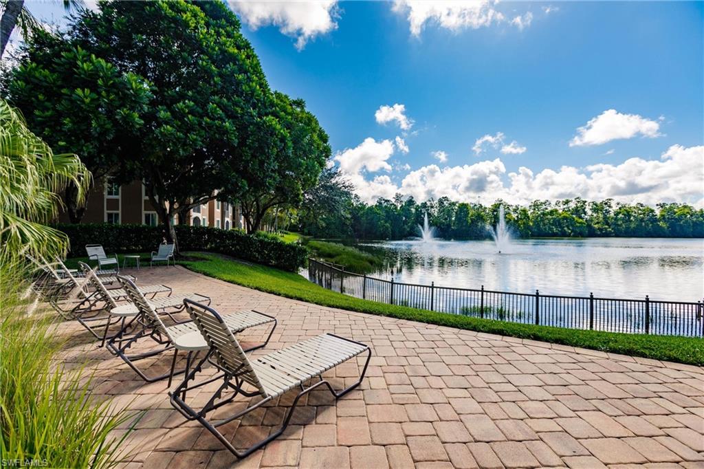 1230 Reserve Way, Unit 302 Naples, FL 34105 - Photo 22 of 28 a view of a backyard with a garden