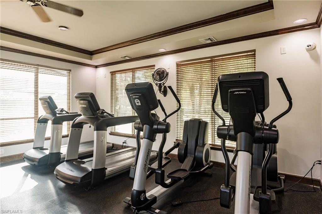 1230 Reserve Way, Unit 302 Naples, FL 34105 - Photo 27 of 28 a view of a room with gym equipment