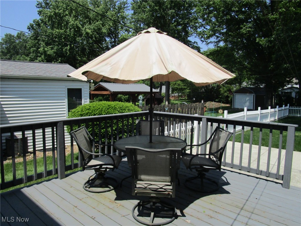 134 Ridgewood Drive Youngstown, OH 44512 - Photo 18 of 29 Wooden deck featuring outdoor dining area