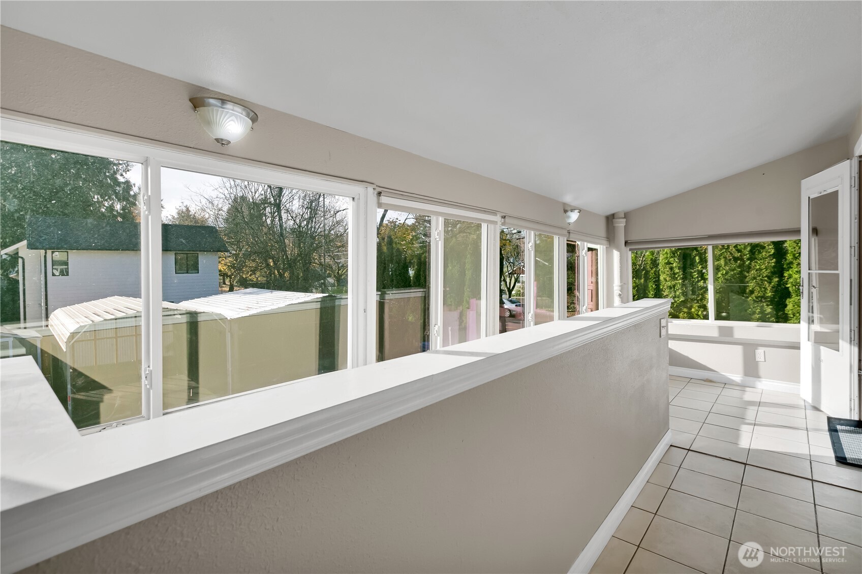 1547 Southwest Myrtle Street Seattle, WA 98106 - Photo 16 of 40 a view of a patio with a fireplace