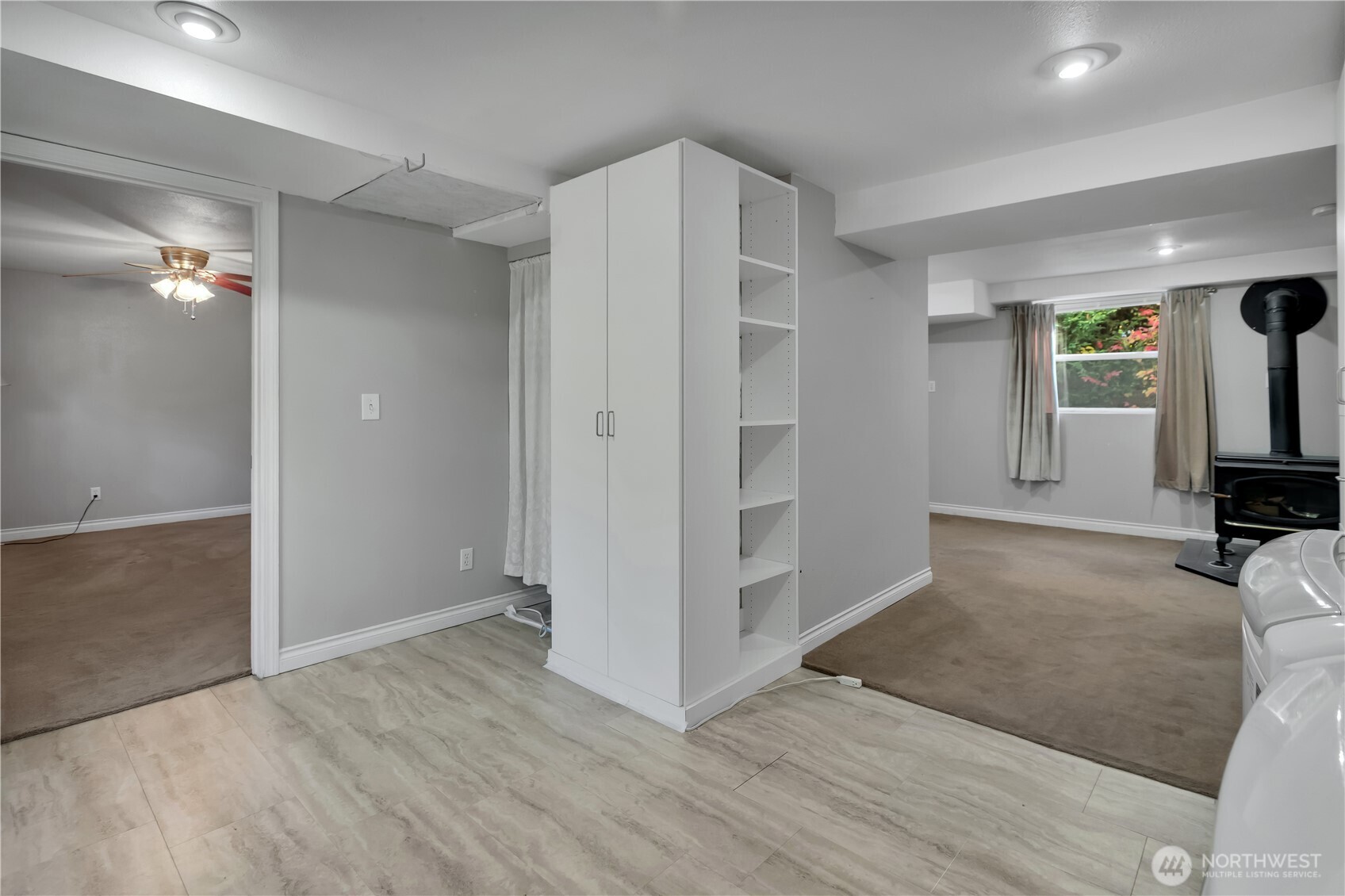 1547 Southwest Myrtle Street Seattle, WA 98106 - Photo 24 of 40 wooden floor in an empty room and a window