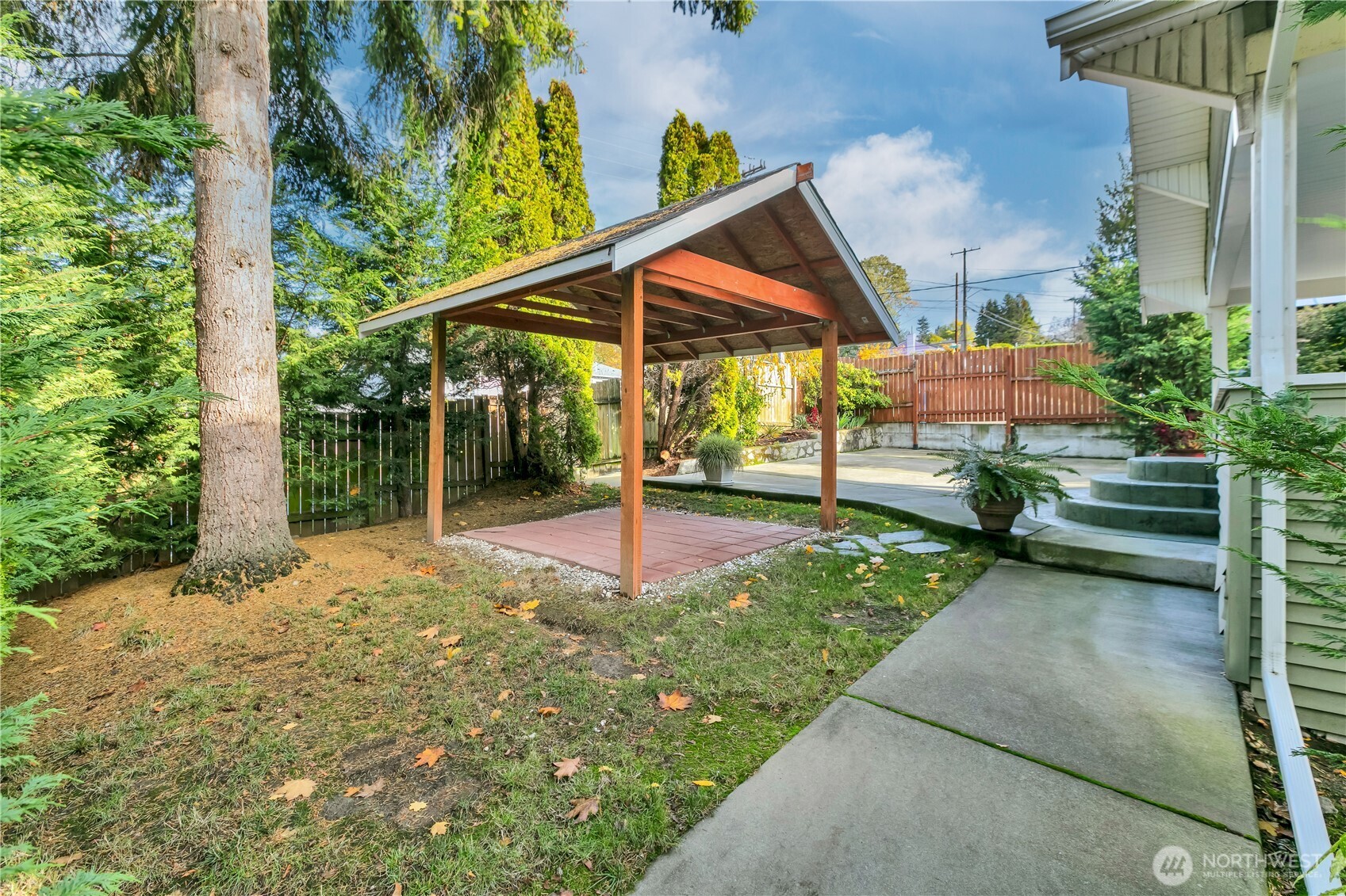 1547 Southwest Myrtle Street Seattle, WA 98106 - Photo 30 of 40 a view of a house with a yard