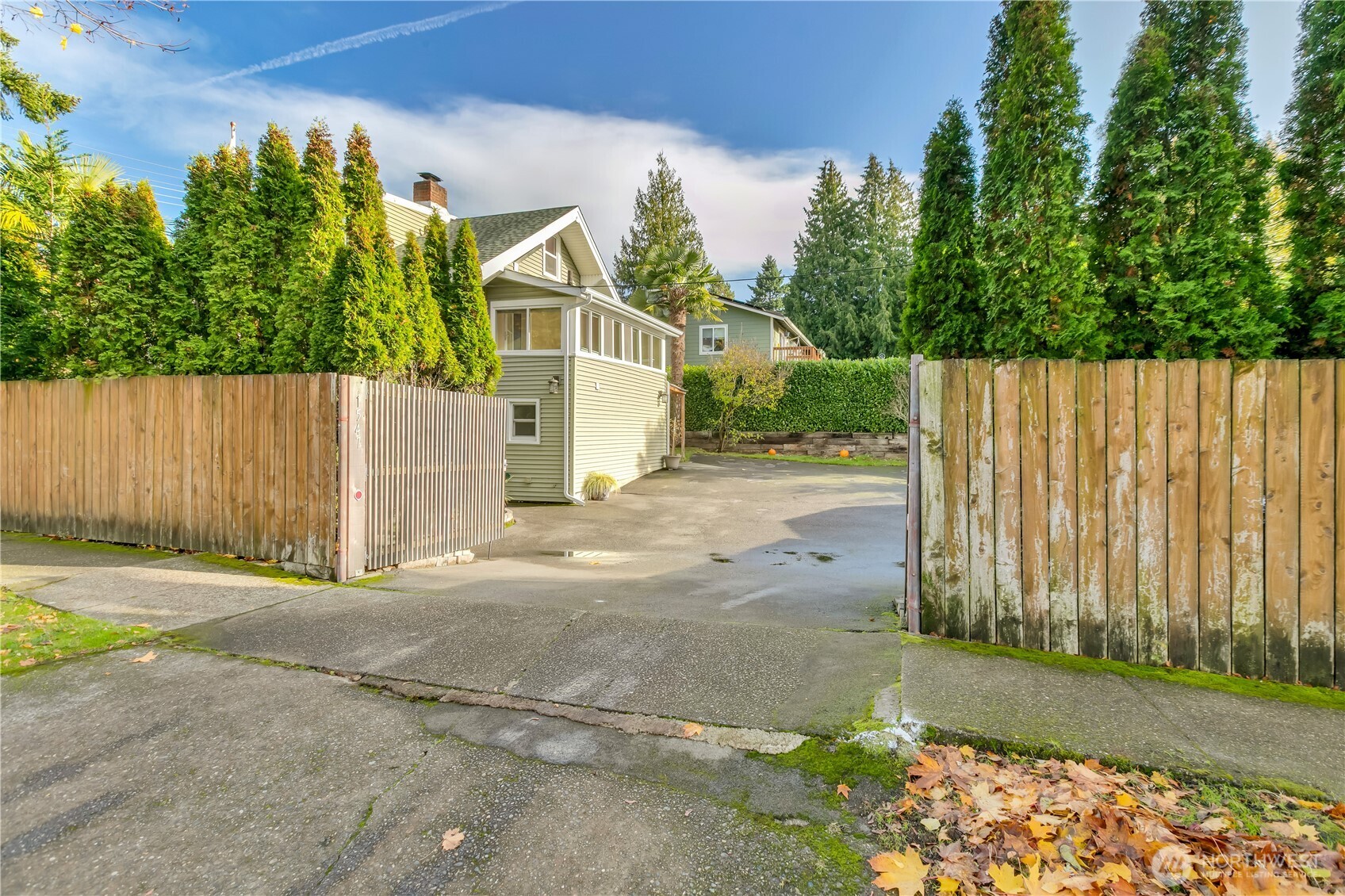 1547 Southwest Myrtle Street Seattle, WA 98106 - Photo 32 of 40 a view of a garage with a tree