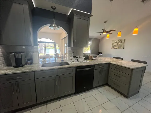 a bathroom with a sink vanity and a mirror