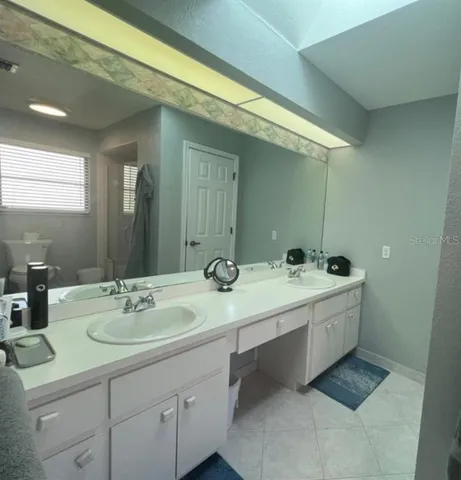 a bathroom with a shower and toilet