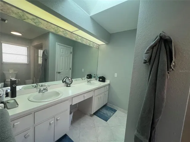 a bathroom with a shower and a toilet