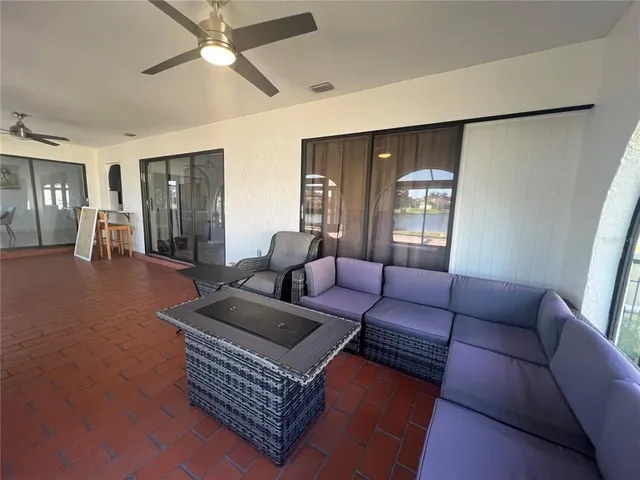 a living room with furniture and a rug