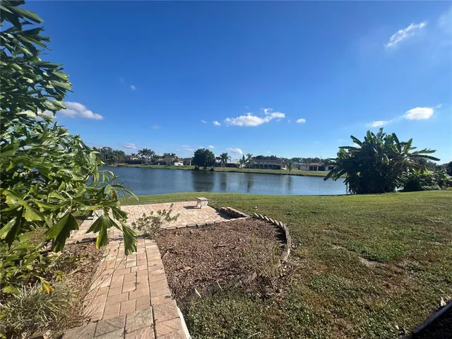 a view of a lake with a city