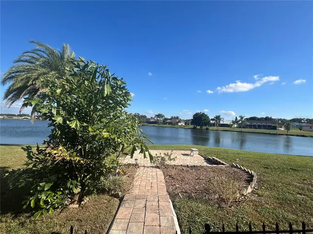 a view of a balcony with wooden floor