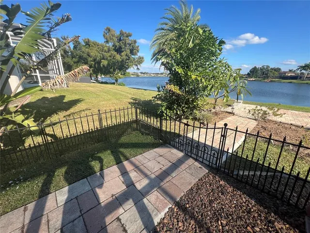 a view of balcony with wooden floor