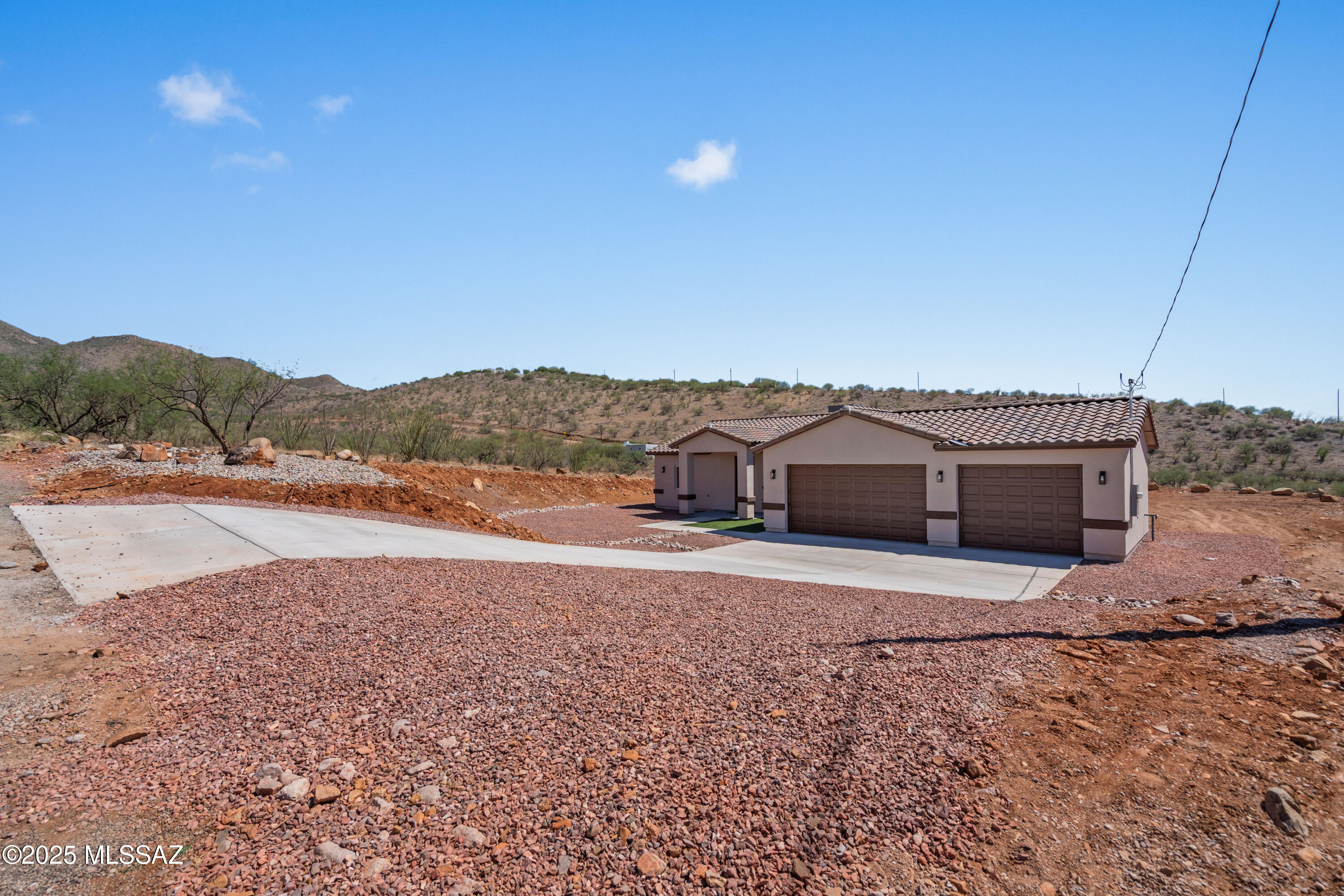 1667 Ave Calamar Rio Rico, AZ 85648 - Photo 2 of 33 a view of a house with a yard