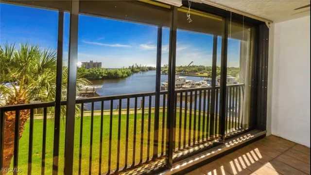 a view of balcony with a floor to ceiling window window and wooden floor