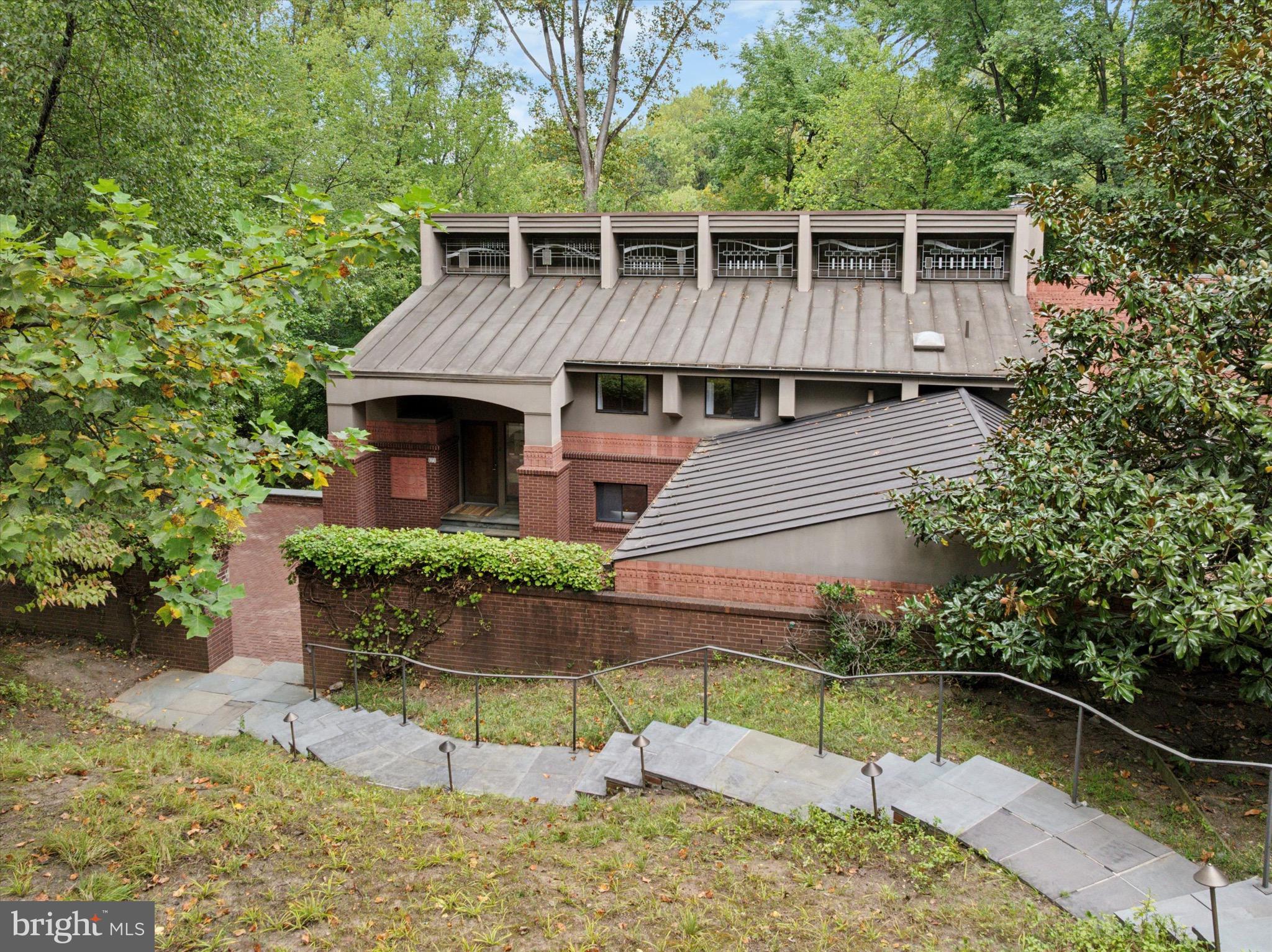 175 Old Gulph Road Wynnewood, PA 19096 - Photo 2 of 87 a front view of a house with a yard