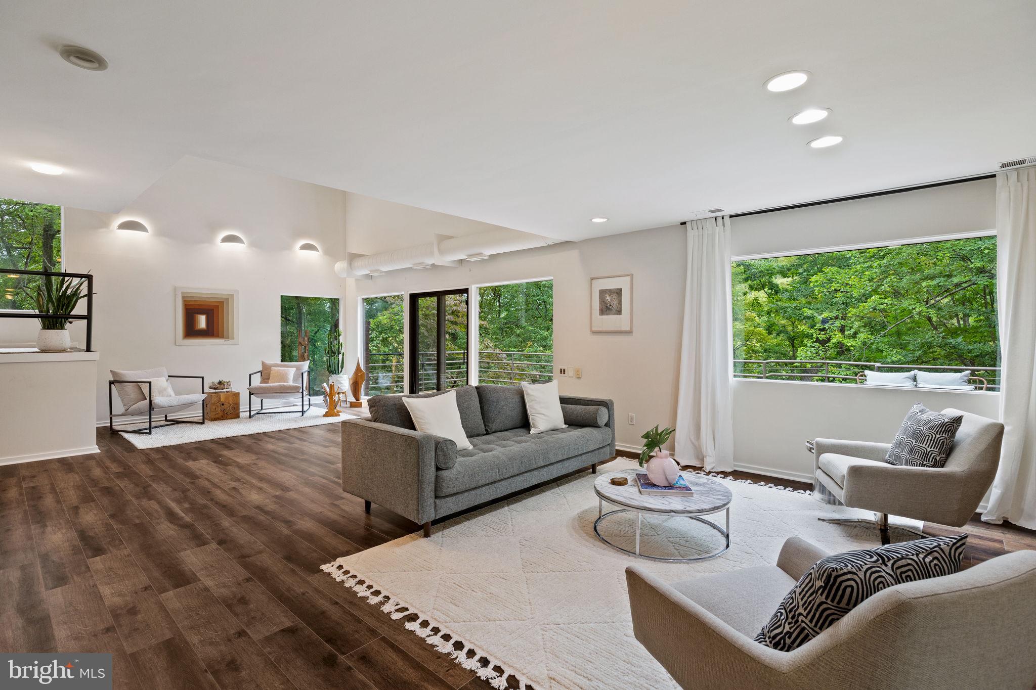 175 Old Gulph Road Wynnewood, PA 19096 - Photo 21 of 87 a living room with furniture and a large window