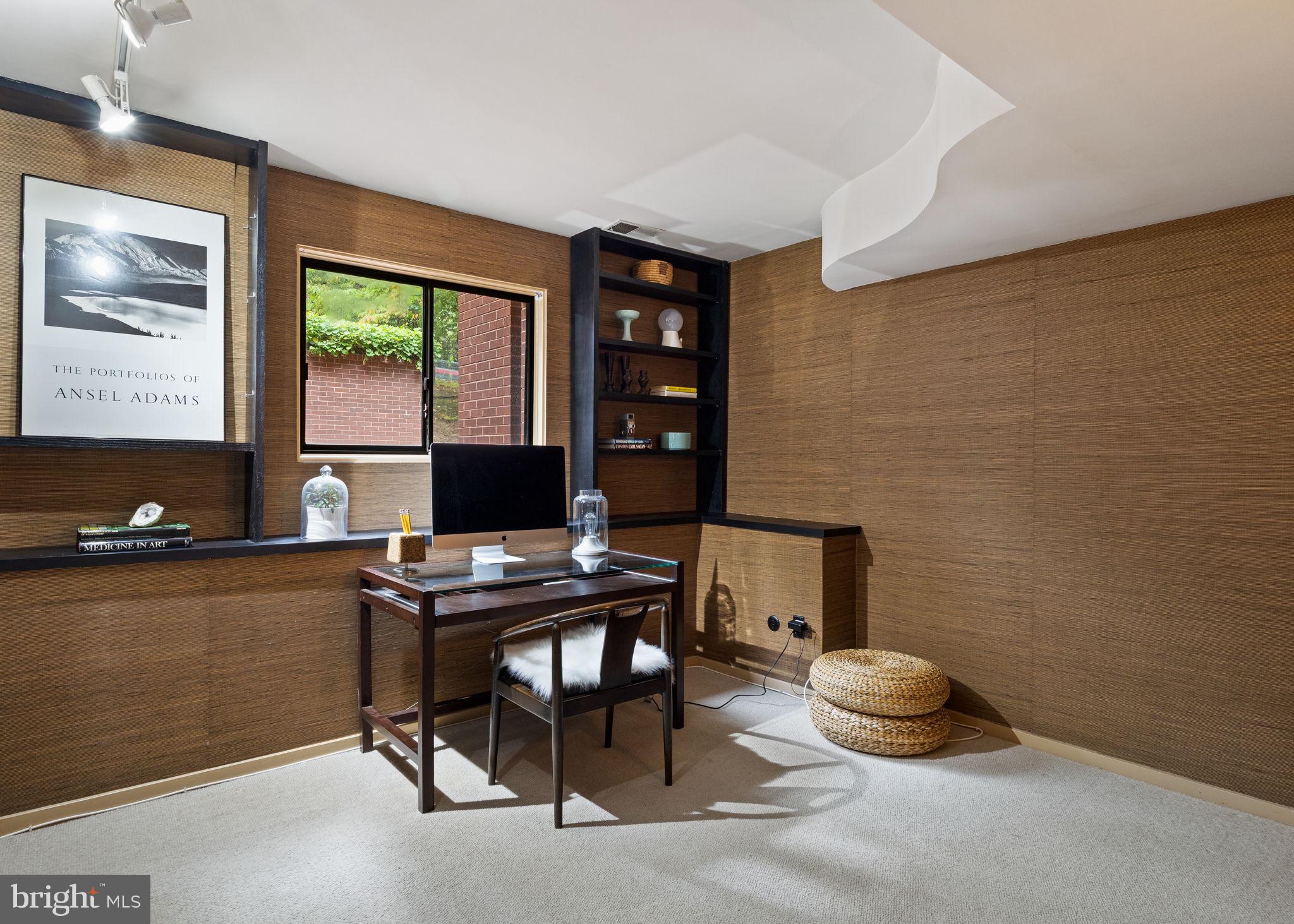 175 Old Gulph Road Wynnewood, PA 19096 - Photo 25 of 87 a view of a workspace with furniture and a window