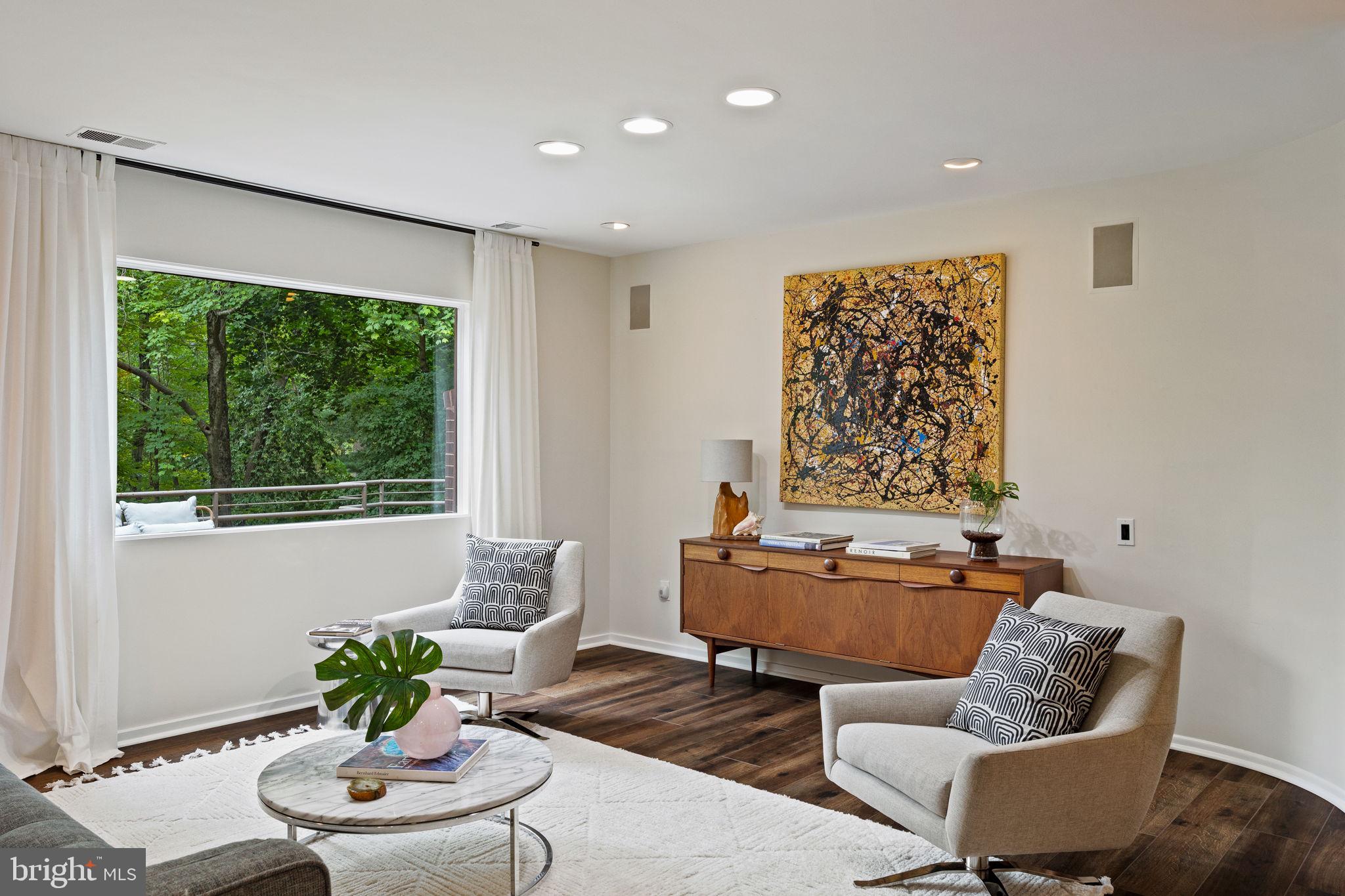 175 Old Gulph Road Wynnewood, PA 19096 - Photo 26 of 87 a living room with furniture and a large window