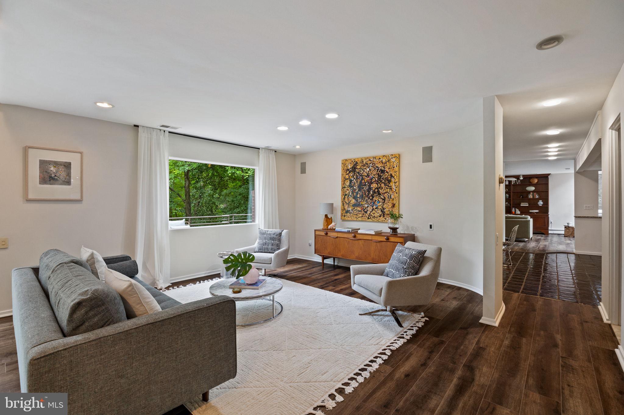 175 Old Gulph Road Wynnewood, PA 19096 - Photo 27 of 87 a living room with furniture and a wooden floor