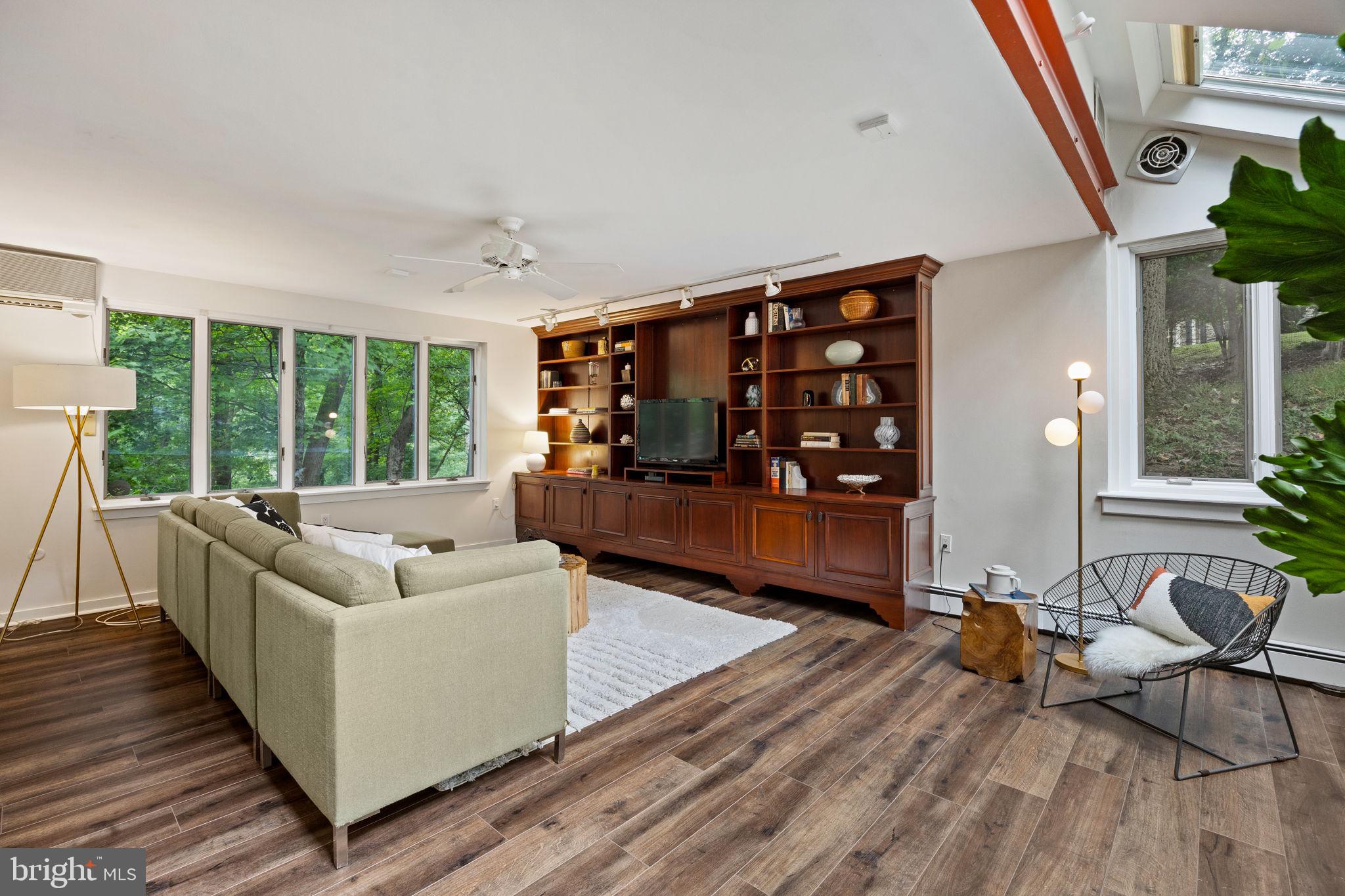 175 Old Gulph Road Wynnewood, PA 19096 - Photo 34 of 87 a living room with furniture and a wooden floor