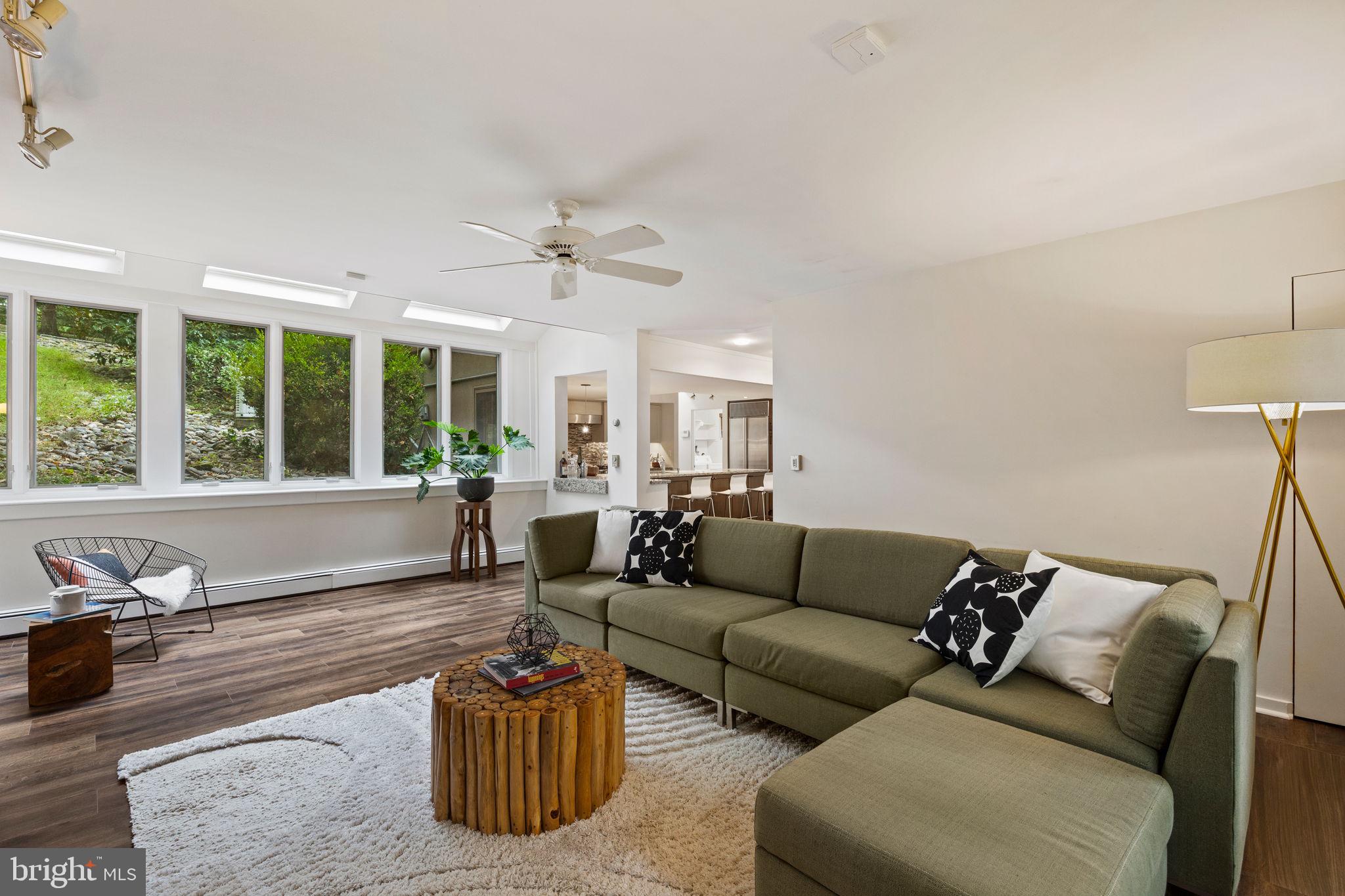 175 Old Gulph Road Wynnewood, PA 19096 - Photo 36 of 87 a living room with furniture and a large window