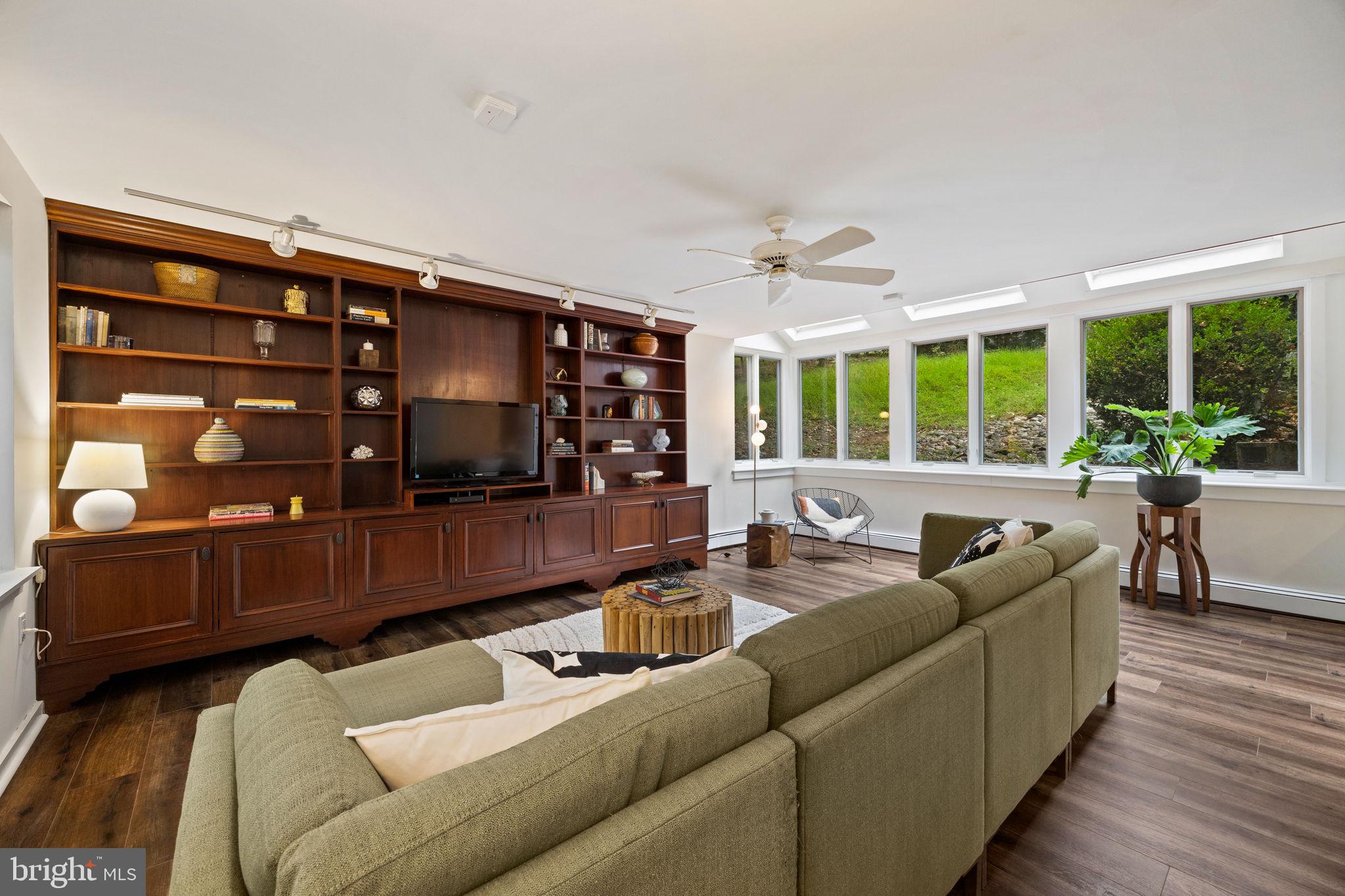 175 Old Gulph Road Wynnewood, PA 19096 - Photo 37 of 87 a living room with furniture and a large window