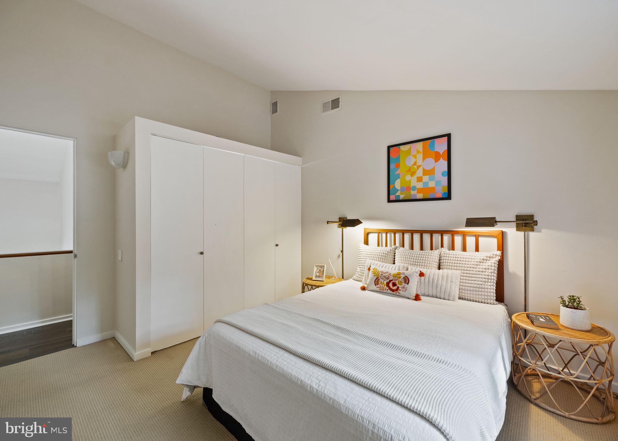 175 Old Gulph Road Wynnewood, PA 19096 - Photo 47 of 87 a bedroom with bed and wall painting